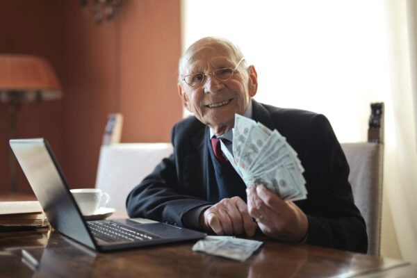 Robert The Senior Guy Man Holding Money